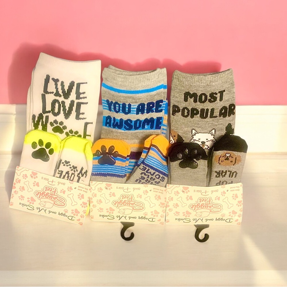 NWT 3 sets of colorful fun “one size fits most most”
Doggy and me socks.